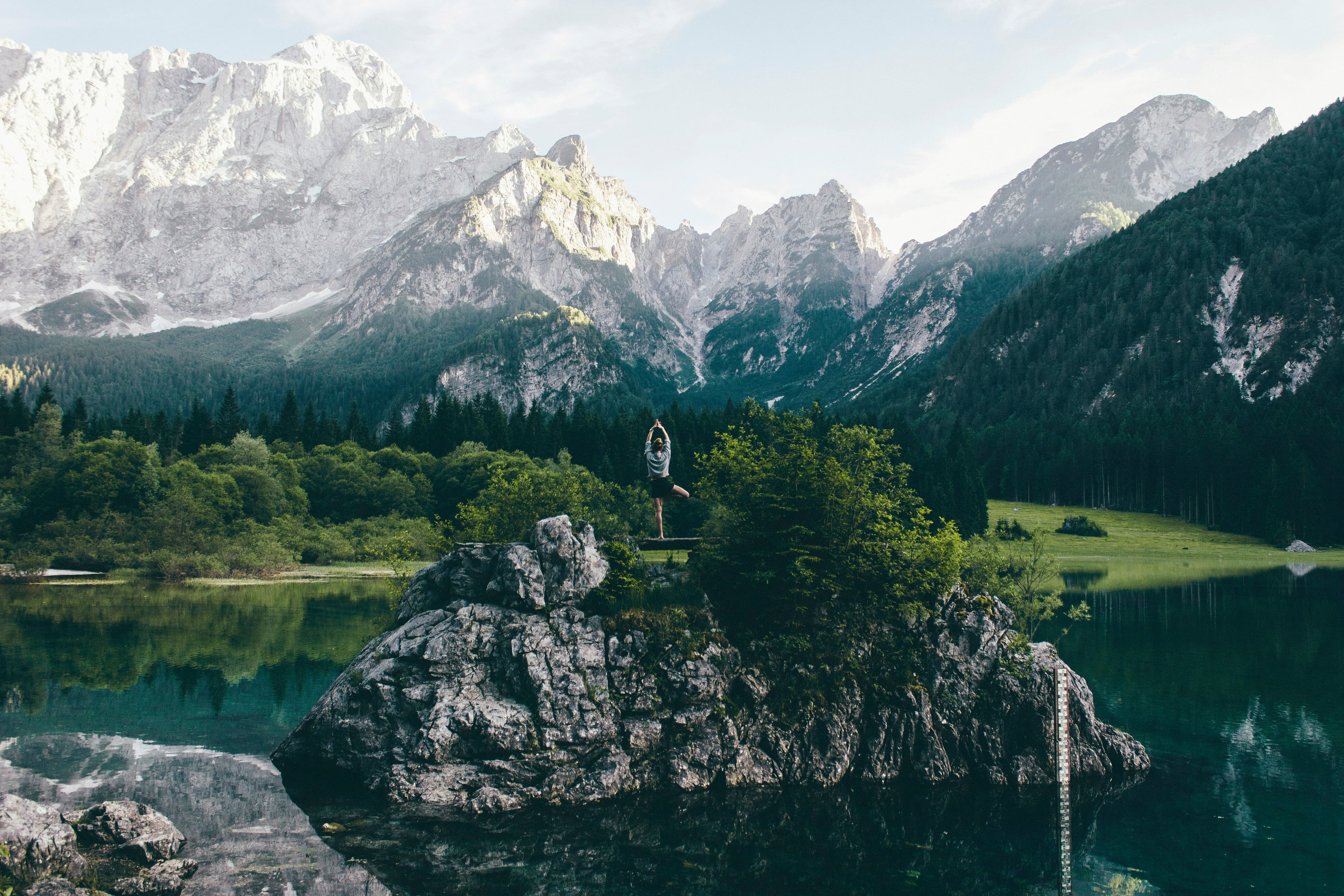 An alpine lake below a range of mountain peaks